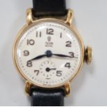 A lady's 1950's 9ct gold Tudor Royal manual wind wrist watch, with Arabic dial and subsidiary