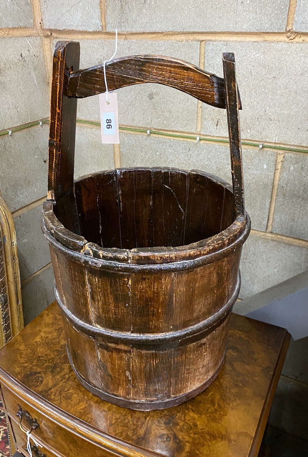 A Chinese staved wood rice bucket, height 56cm