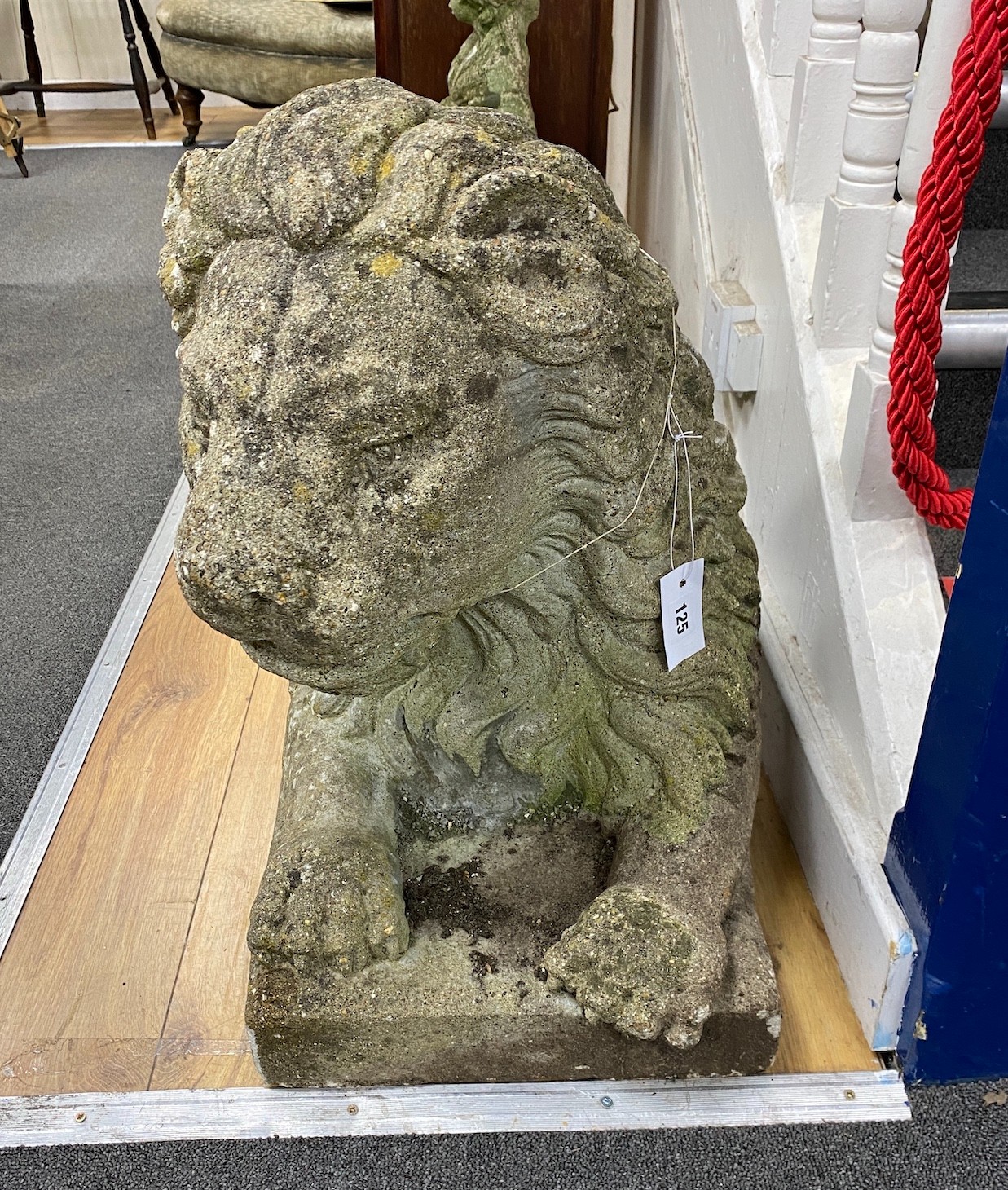 A large reconstituted stone recumbent lion garden ornament, length 91cm, depth 33cm, height 60cm - Image 2 of 3