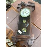 An early 20th century American Waterbury Clock Company wall clock, height 100cms