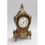 A late 19th century Boulle work mantel timepiece with key, 31cms high