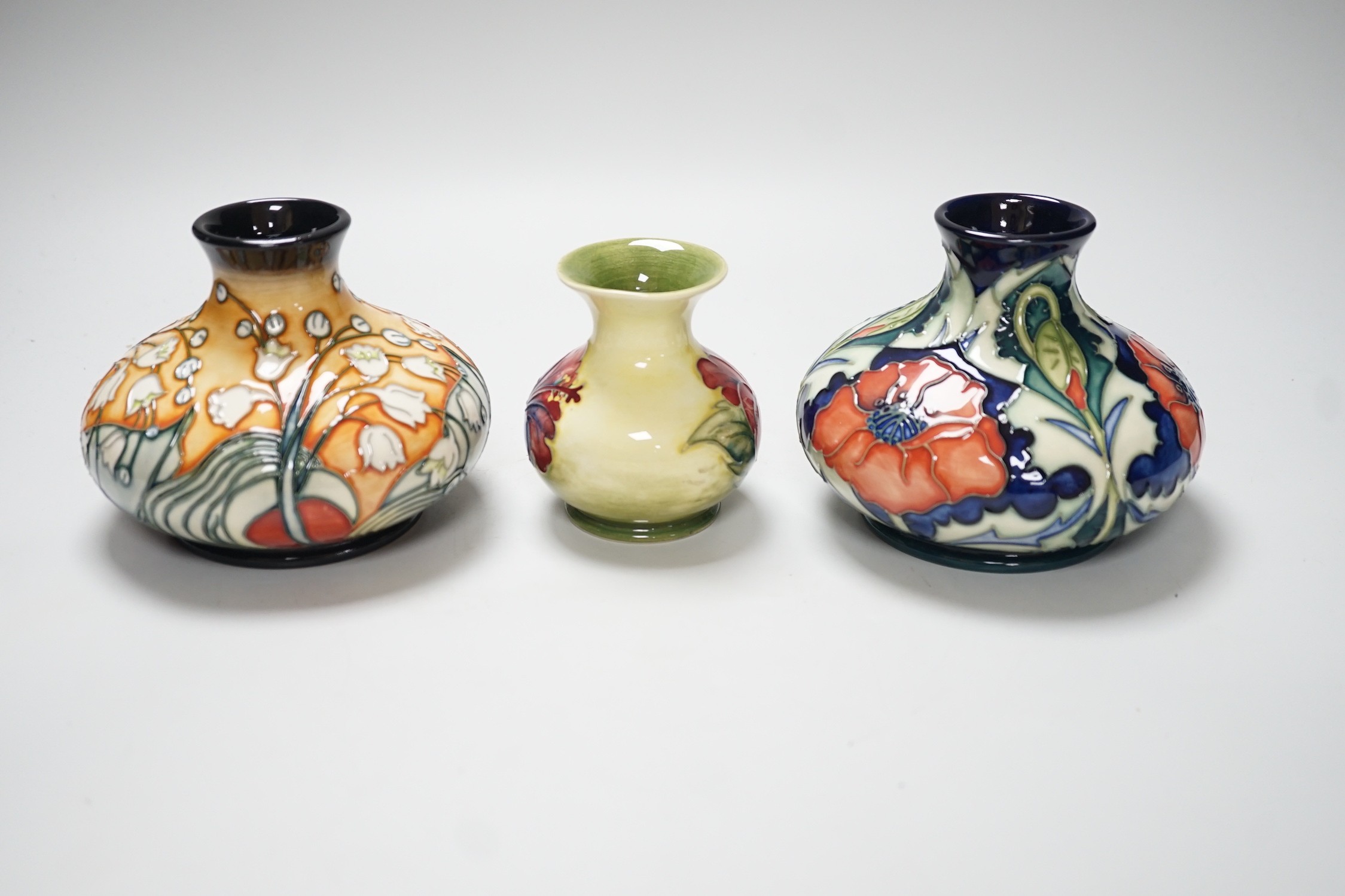 Three Moorcroft vases, in Poppy, Hibiscus and Tulip designs, tallest 10.5 cm, one boxed - Image 3 of 5