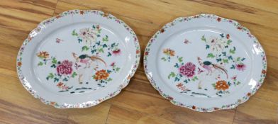 A pair of Chinese Famille Rose ‘peacock’ oval dishes, Qianlong period, 43cms wide