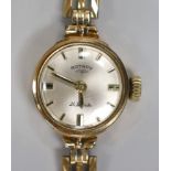 A lady's 9ct gold Rotary manual wind wrist watch, on associated 9ct gold bracelet, overall 17cm,