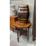 A copper bound staved oak barrel, height 56cm together with a late Victorian octagonal centre table