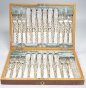 A cased set of twelve pairs of Victorian mother of pearl handed silver fish eaters (fork missing)