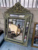 A 19th century French embossed brass wall mirror with marginal plate, width 92cm, height 136cm