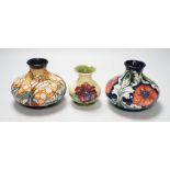 Three Moorcroft vases, in Poppy, Hibiscus and Tulip designs, tallest 10.5 cm, one boxed