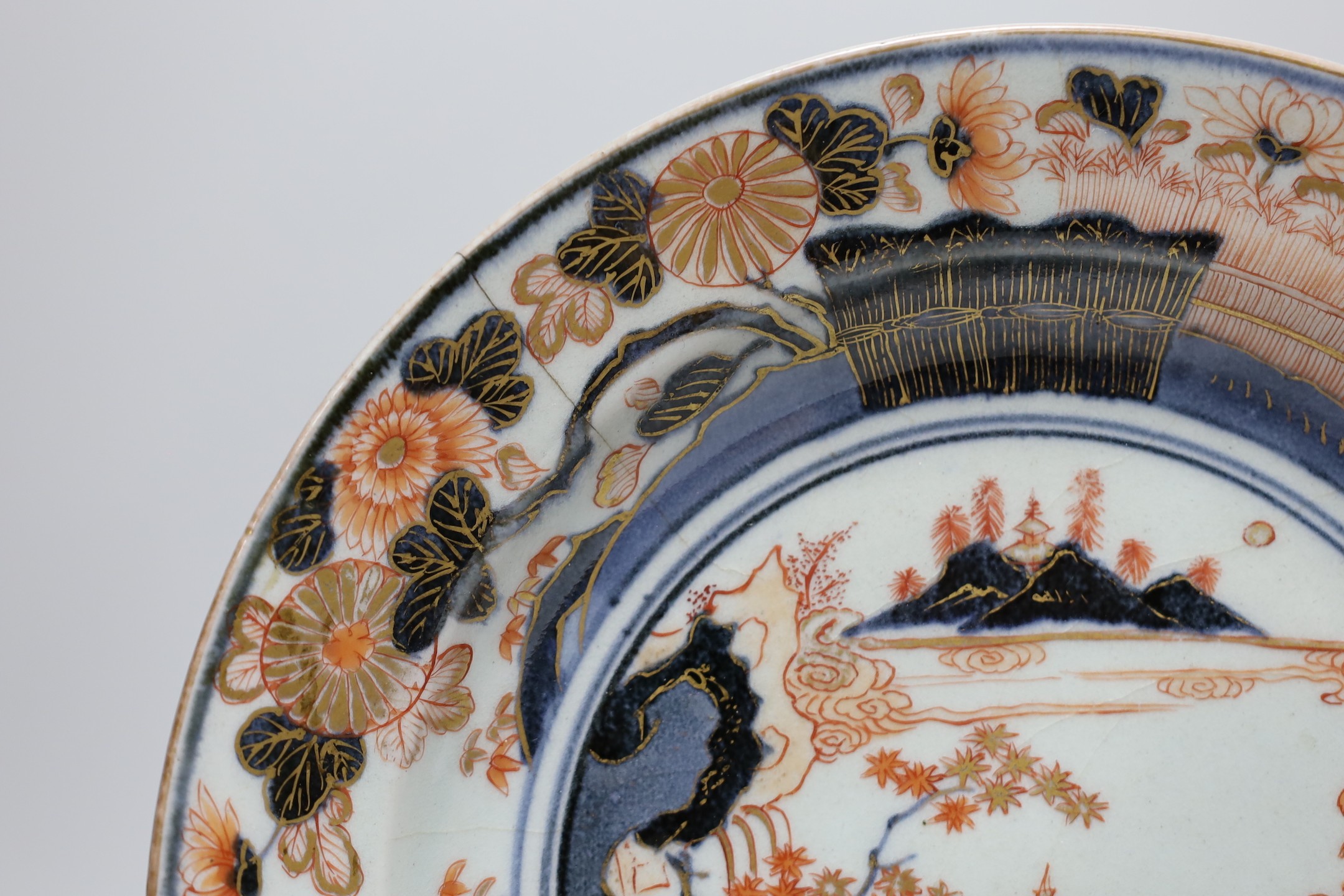 A Japanese Arita dish, late 17th century, painted in Imari palette, stilt marks, cracked, 28cms - Image 2 of 4