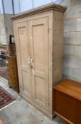 A Victorian painted pine two door kitchen cabinet, width 116cm, depth 36cm, height 202cm