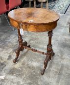 A Victorian oval marquetry inlaid walnut work table (missing basket), width 56cm, depth 42cm, height