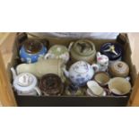 A quantity of various teapots, jugs and biscuit barrels including Ironstone, Doulton etc.