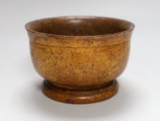 A turned burr maple bowl on pedestal base, 17cms diameter