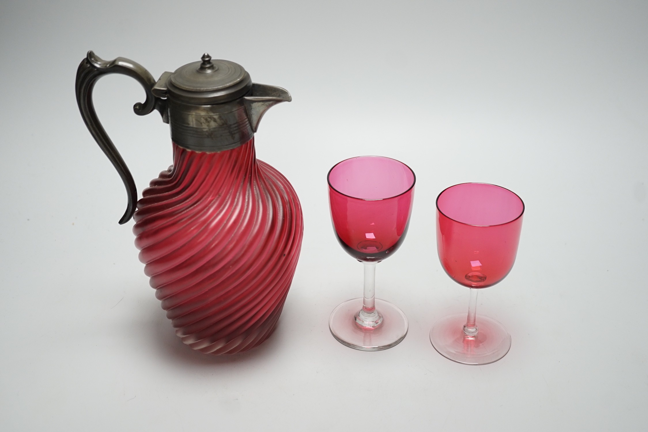 A Victorian wrythen moulded cranberry glass jug, 22cm high, and assorted wine glasses - Image 2 of 3