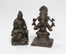 A Japanese Meiji period bronze of a seated figure, inscription to base together with an Indian