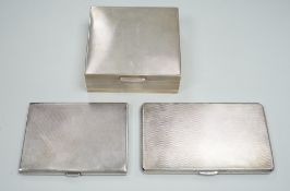 Two 1930's/1940's engine turned silver cigarette cases, largest 14cm and a later silver mounted