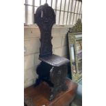 A late Victorian carved fruitwood hall chair, height 118cm