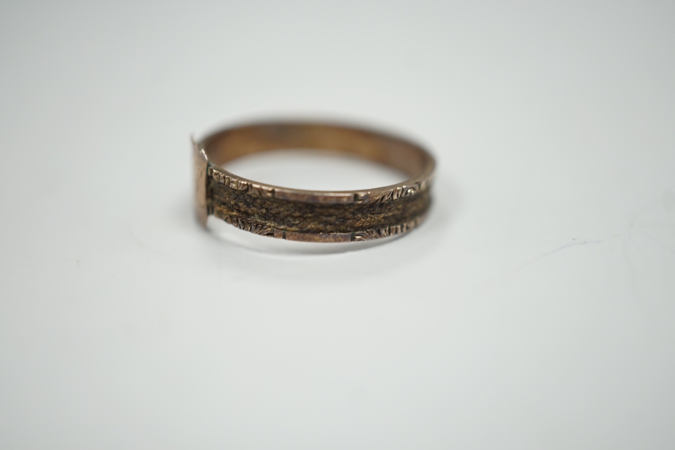 A Victorian yellow metal mourning ring, with engraved monogram and shank inset with plaited hair, - Image 2 of 4