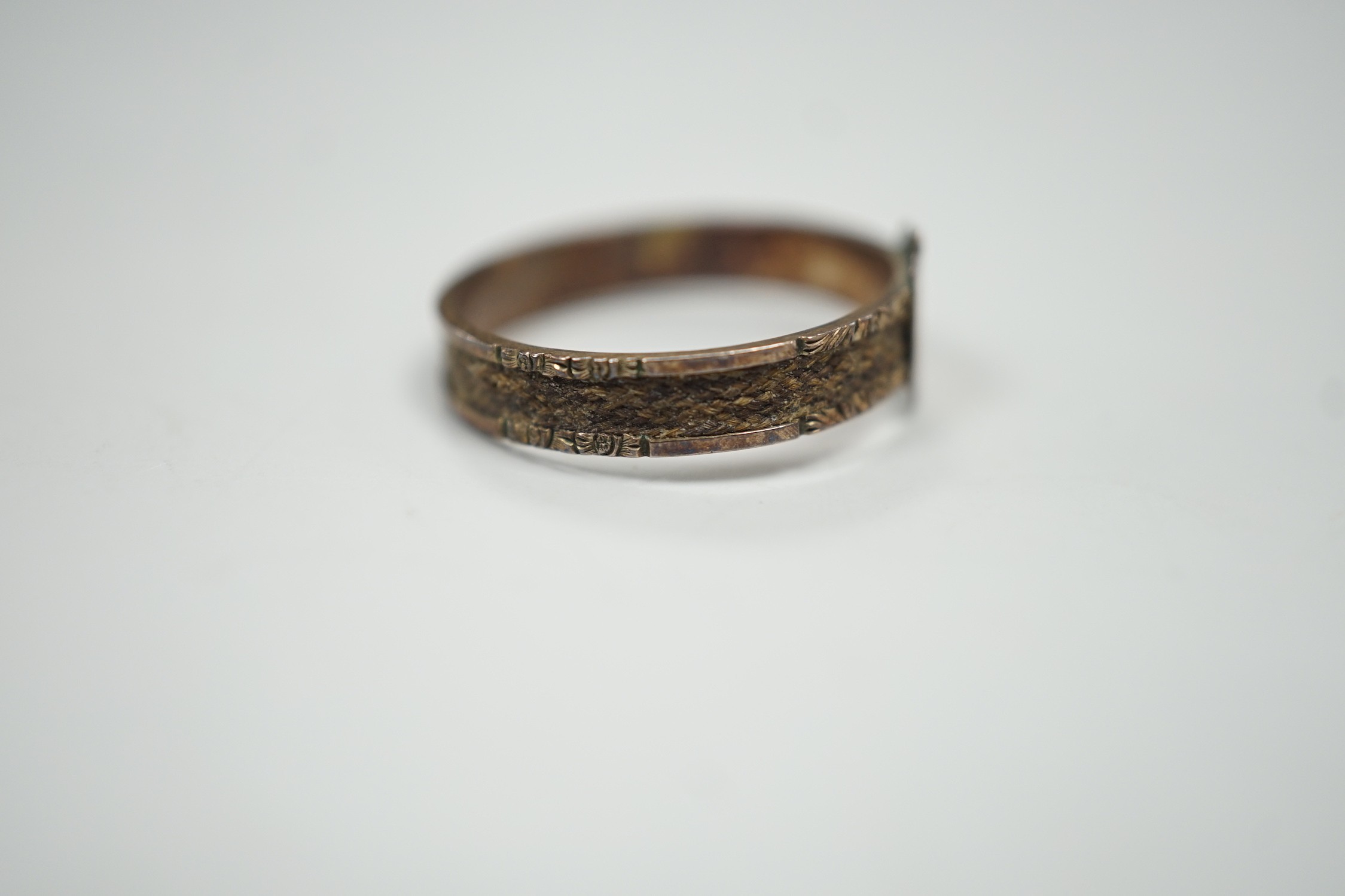 A Victorian yellow metal mourning ring, with engraved monogram and shank inset with plaited hair, - Image 3 of 4