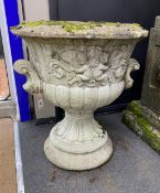 A reconstituted stone campana garden urn, diameter 56cm, height 64cm