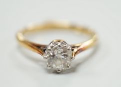 An 18ct, plat and solitaire diamond set ring, size J/K, gross weight 2.2 grams, the stone weighing