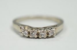 A Canadian Birks 18k white metal and four stone diamond set ring, size I, gross weight 1.8 grams.