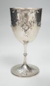 A Victorian embossed silver goblet by Charles Stuart Harris, London, 1875, 14.2cm, 3.3oz.