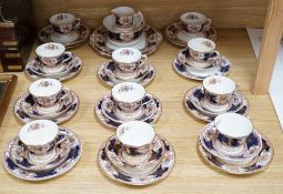 A Crown Staffordshire tea service decorated in white and gilt (46 pieces)