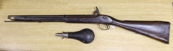 A 19th century percussion cap carbine musket with name stamped to lock plate and a shot flask,
