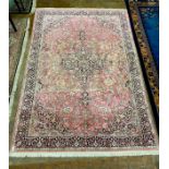 A North West Persian pink ground carpet, 280 x 186cm