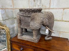 A rattan elephant stool, width 66cm, height 57cm