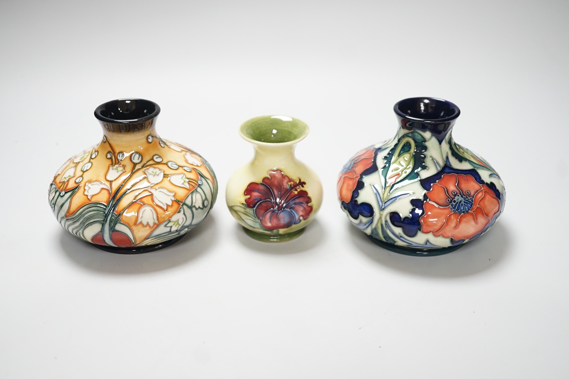 Three Moorcroft vases, in Poppy, Hibiscus and Tulip designs, tallest 10.5 cm, one boxed - Image 2 of 5