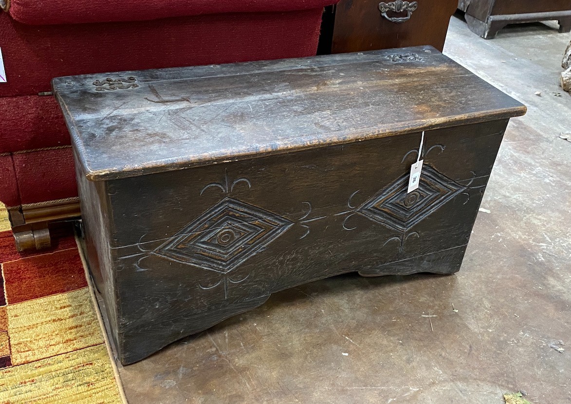 A 17th century style carved oak coffer, length 91cm, depth 36cm, height 48cm