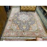 A Persian blue ground carpet, 360 x 270cm