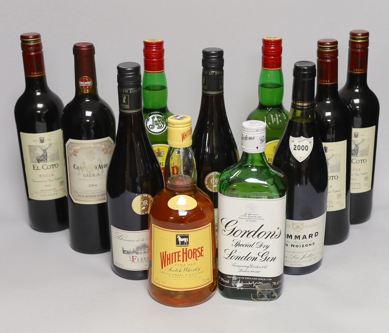 A quantity wine and spirits including Fleurie, Pommard, El Coto Rioja, Chateau D’Aydie, Gordons, J&B