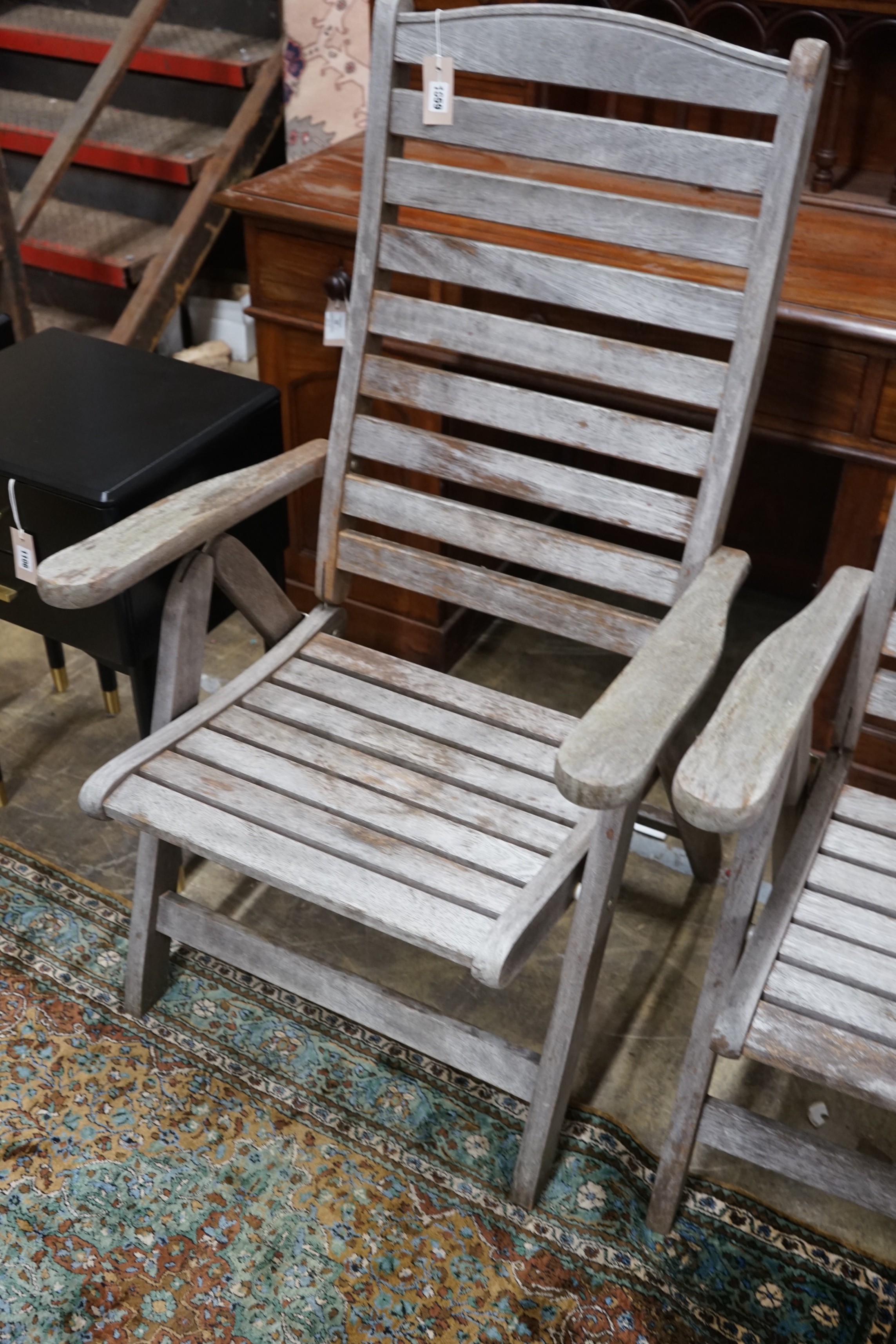 A pair of weathered teak folding garden armchairs, height 112cm - Image 3 of 3
