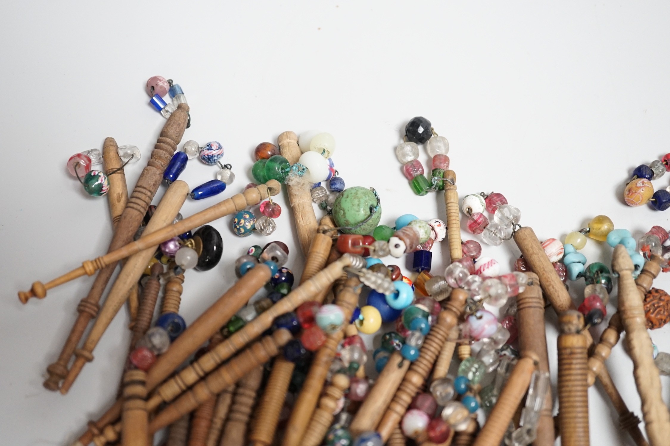 Fifty 19th century finely turned wooden lace bobbins with beaded ends together with 35 ornate wooden - Image 6 of 11