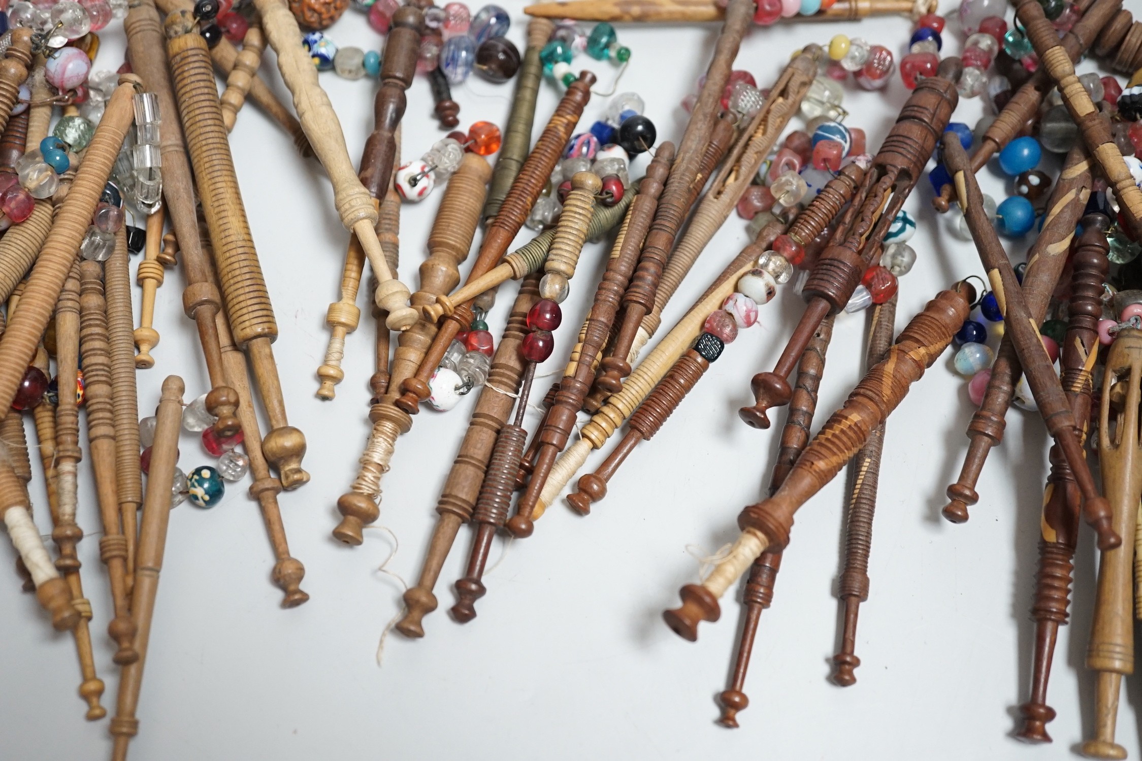 Fifty 19th century finely turned wooden lace bobbins with beaded ends together with 35 ornate wooden - Image 5 of 11