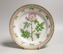 A Royal Copenhagen Flora Danica plate painted with Rosa canina, titled