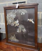 An Art Deco style rectangular mahogany fire screen inset Chinese silkwork panel, width 66cm,