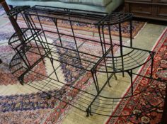 A Victorian style painted wrought iron framed three section pot stand, width 218cm, depth 60cm,
