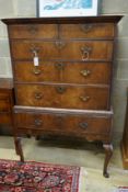 An 18th century banded walnut chest on stand, width 96cm, depth 57cm, height 153cm