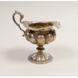 An Edwardian lobed silver pedestal cream jug, Leopold Ltd, London, 1908, 12cm, 5.2oz.