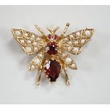 A modern 9ct gold, garnet and split pearl set bug brooch, width 26mm, gross weight 3.8 grams.