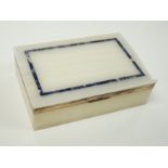A George V silver mounted, lapis lazuli banded white onyx rectangular cigarette box, George