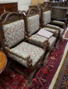 Seven (6+1) early 20th century carved oak upholstered X frame elbow chairs, largest width 75cm,