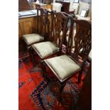 A set of six Chippendale style mahogany dining chairs