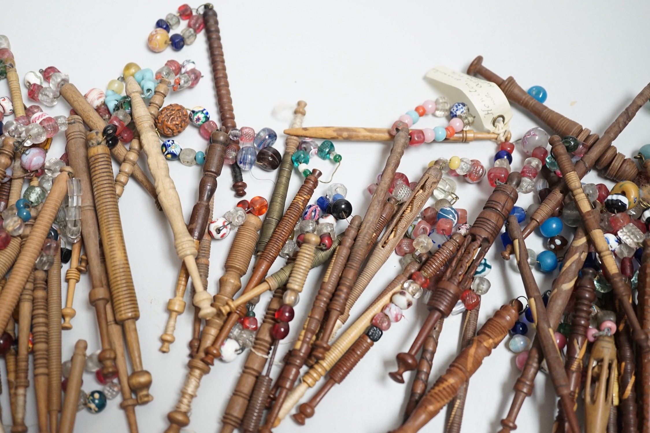 Fifty 19th century finely turned wooden lace bobbins with beaded ends together with 35 ornate wooden - Image 4 of 11