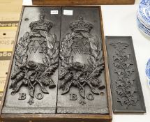 A pair of William IV Board of Ordinance cast iron framed plaques and a smaller plaque, each 54cms