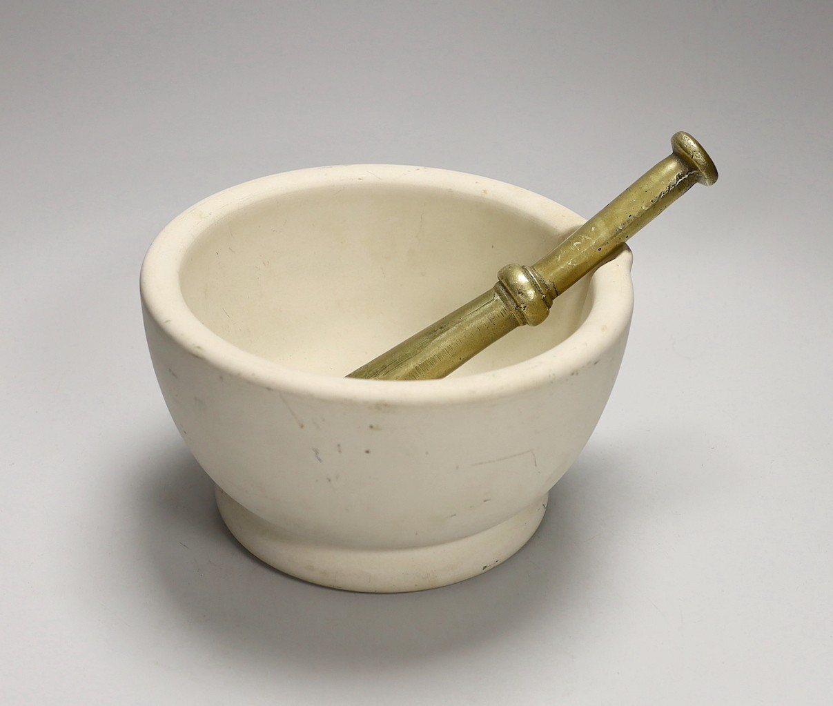 A bronze pestle and a Wedgwood ‘best composition’ mortar